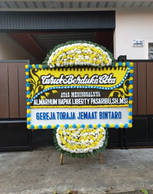 Papan Bunga Duka di Marpoyan Damai